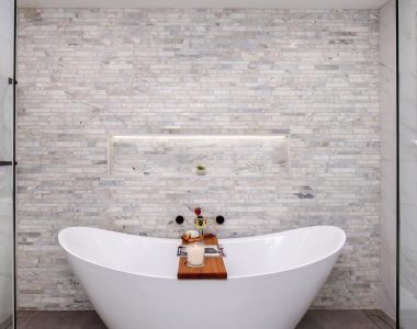 bath infront of mosiac tiles